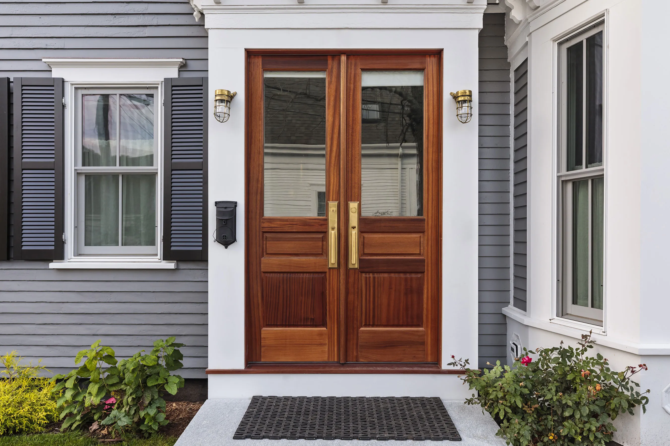 How do you repair outdated hardware and refinish an entryway?