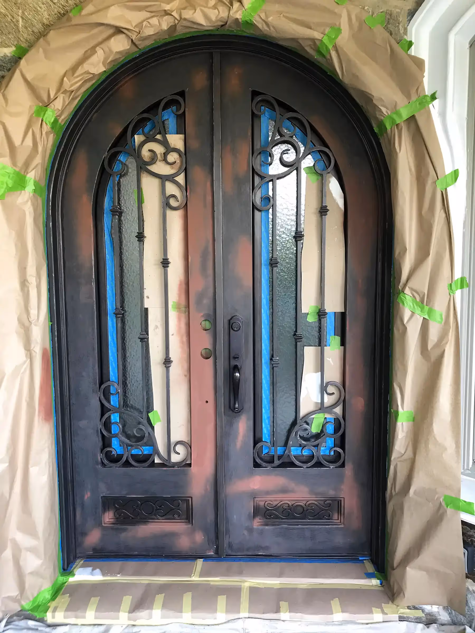 Fantasy Finishes | Iron entryways are a popular architectural choice for homeowners.