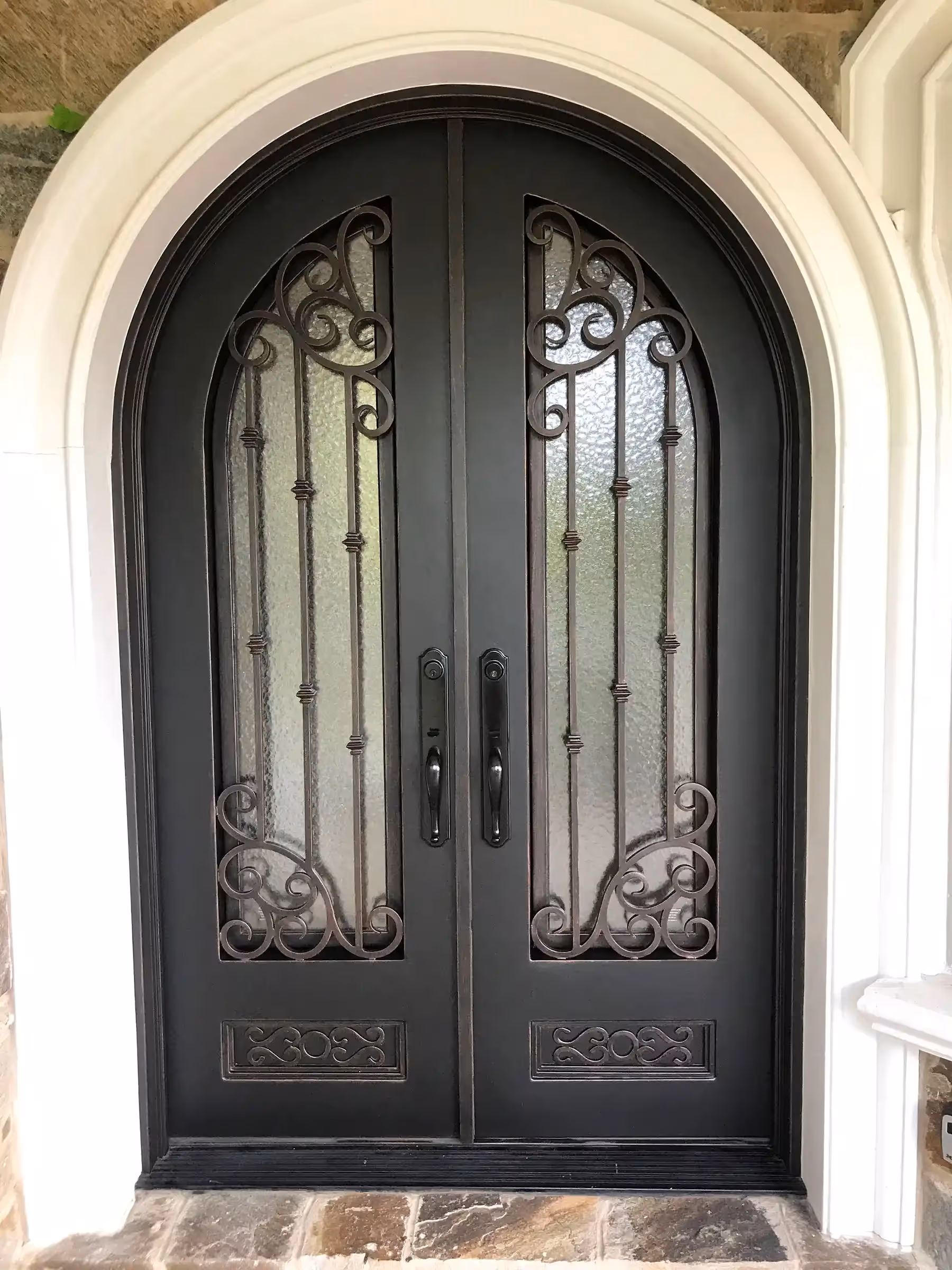 Fantasy Finishes | Iron entryways are a popular architectural choice for homeowners.