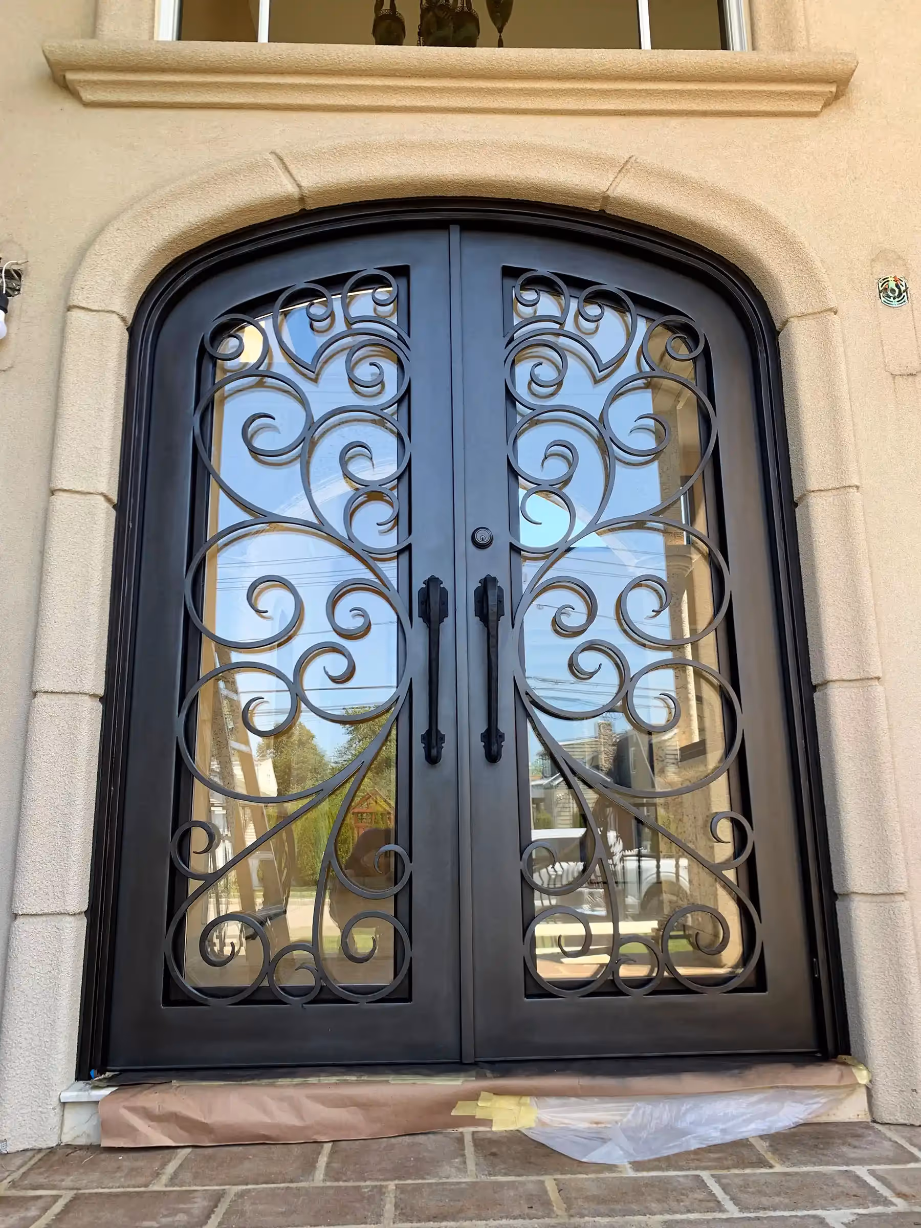 Fantasy Finishes | Iron entryways are a popular architectural choice for homeowners.