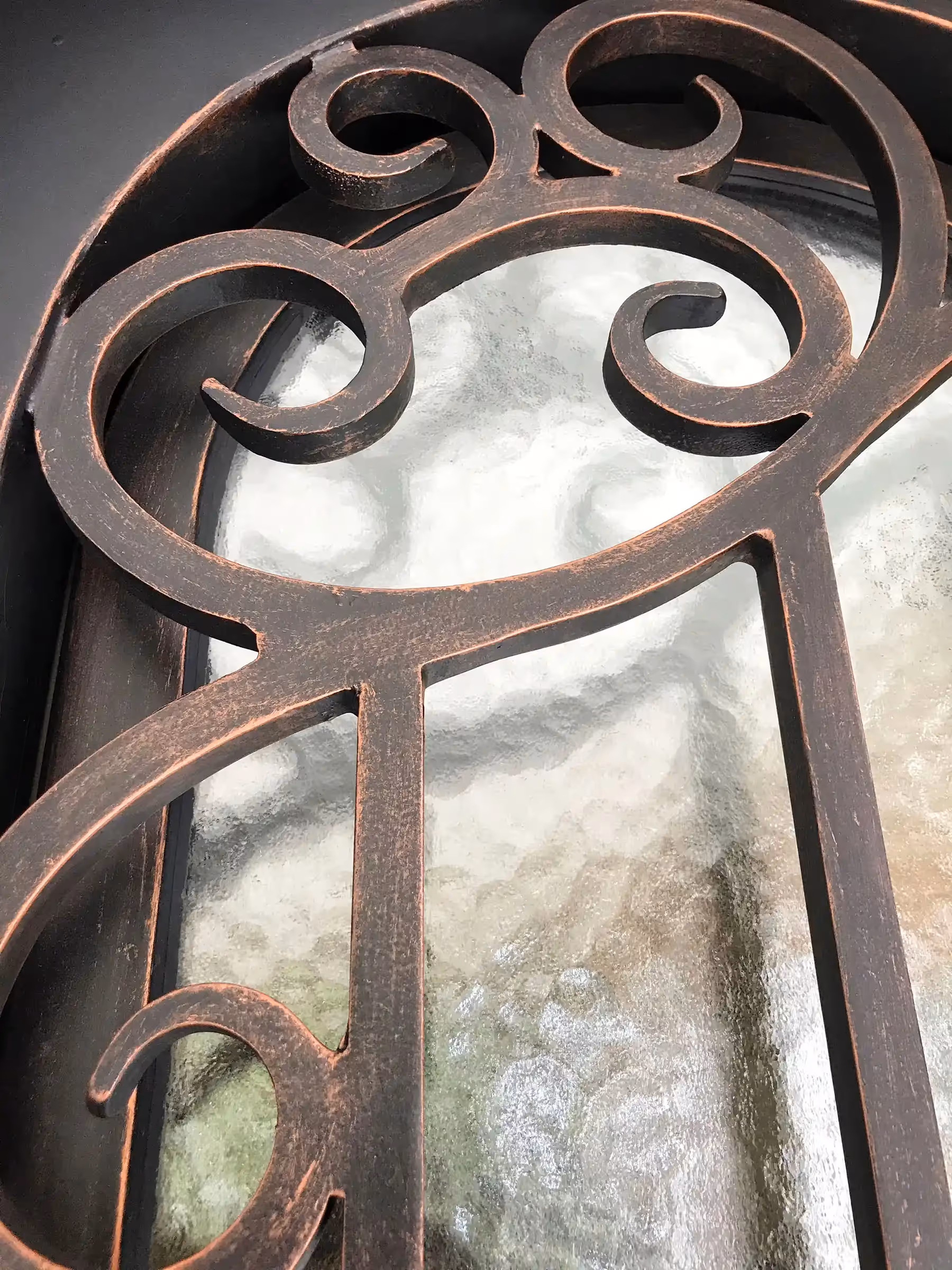 Fantasy Finishes | Iron entryways are a popular architectural choice for homeowners.