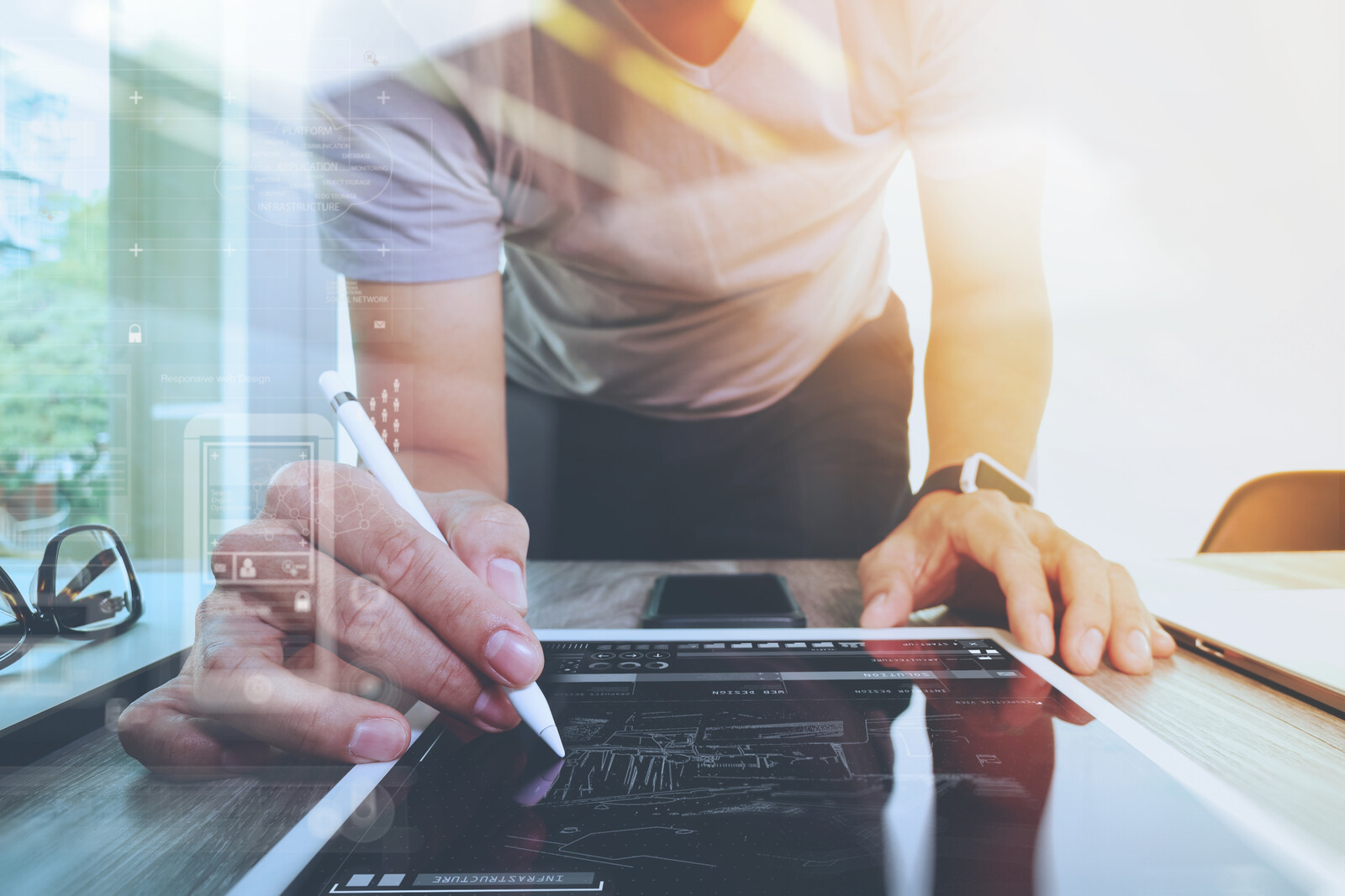 Image of a woman designing a Launch Plan for a business website.
