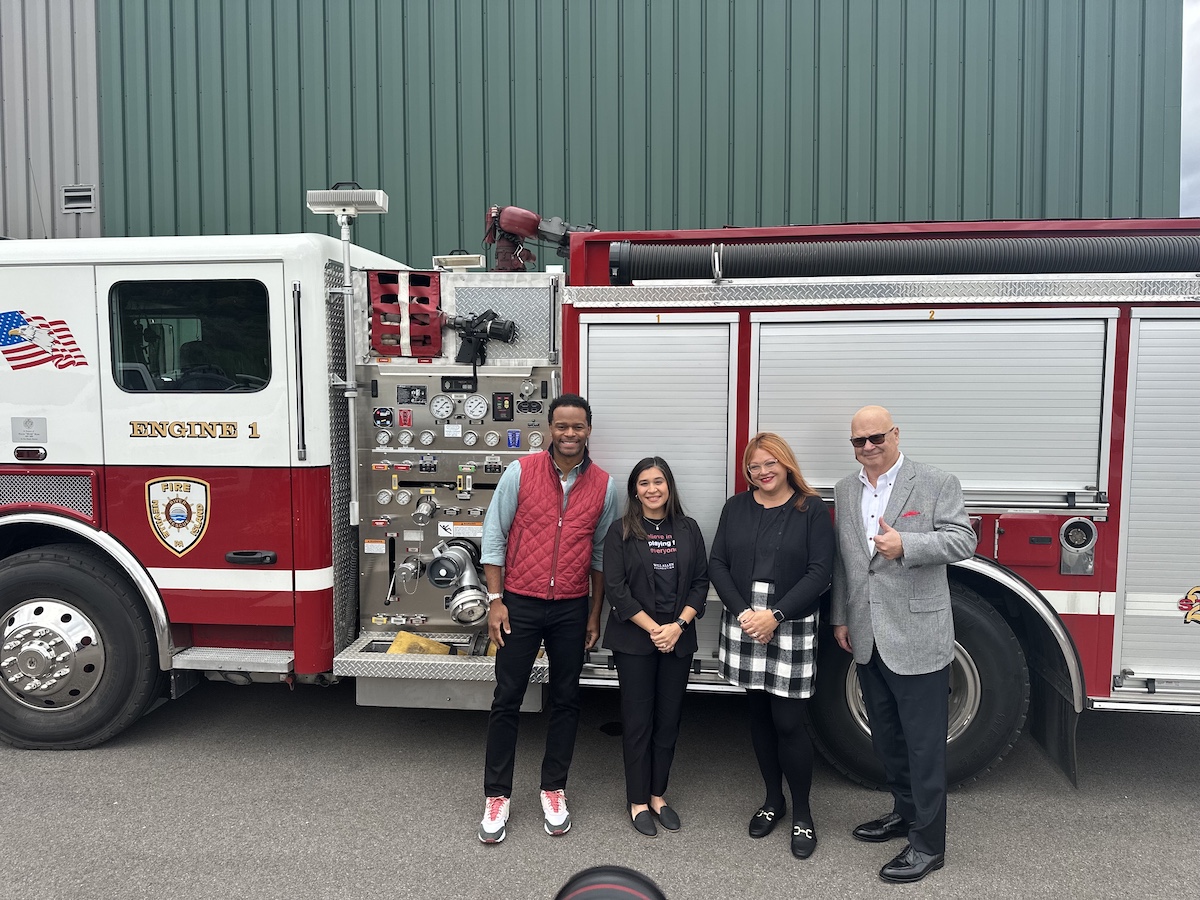 Will Allen Foundation team members in front of a firetruck
