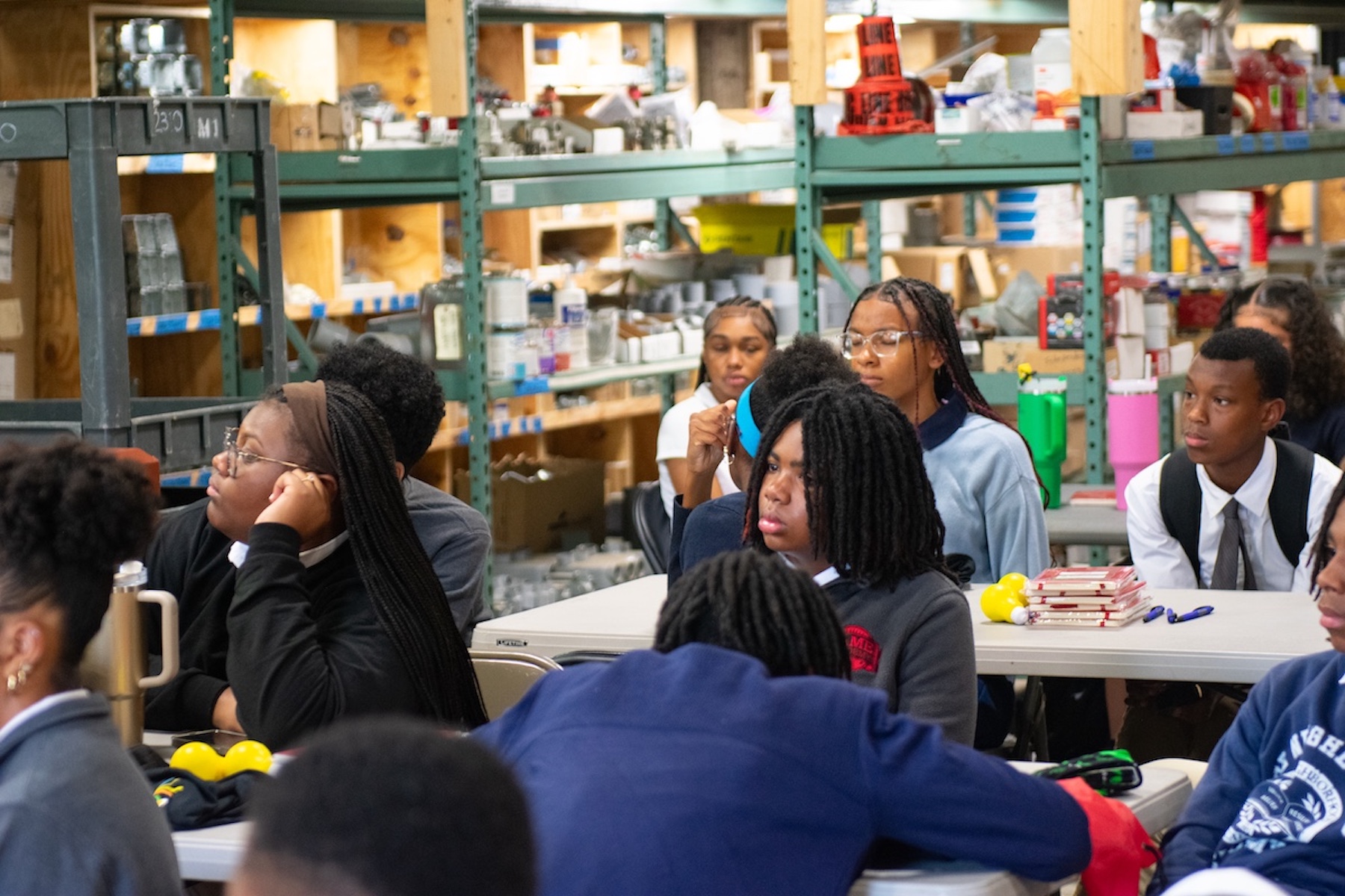 Students listening to a speaker