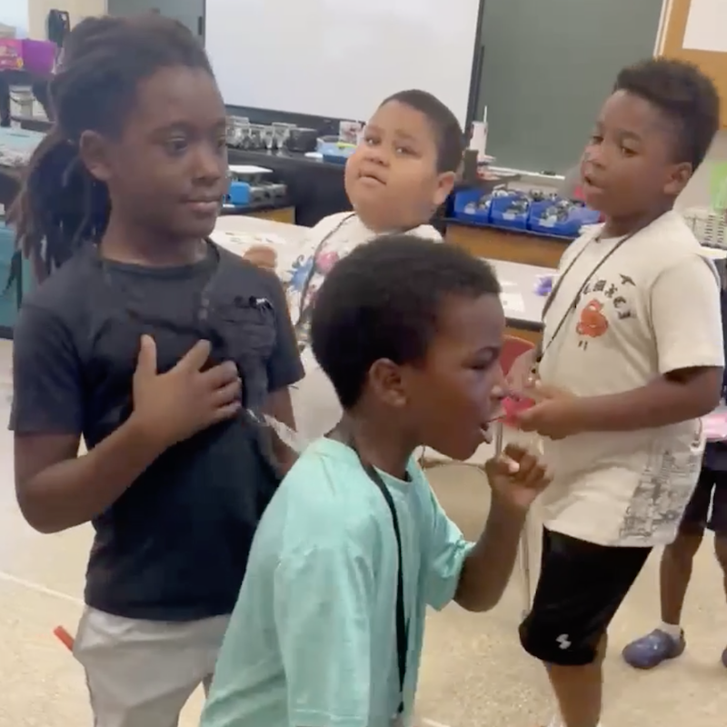 Clairton students dancing and singing.