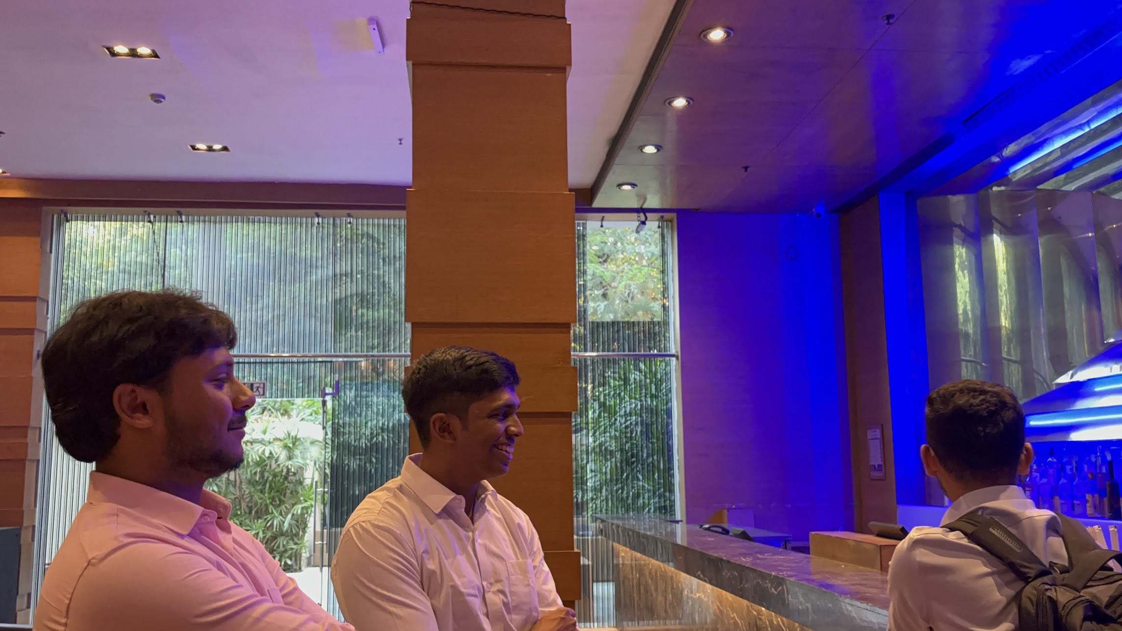 Team discussion at hotel bar