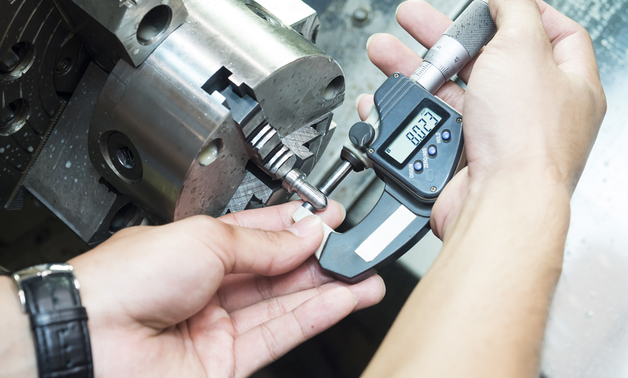 Inspecting and measuring a machined part