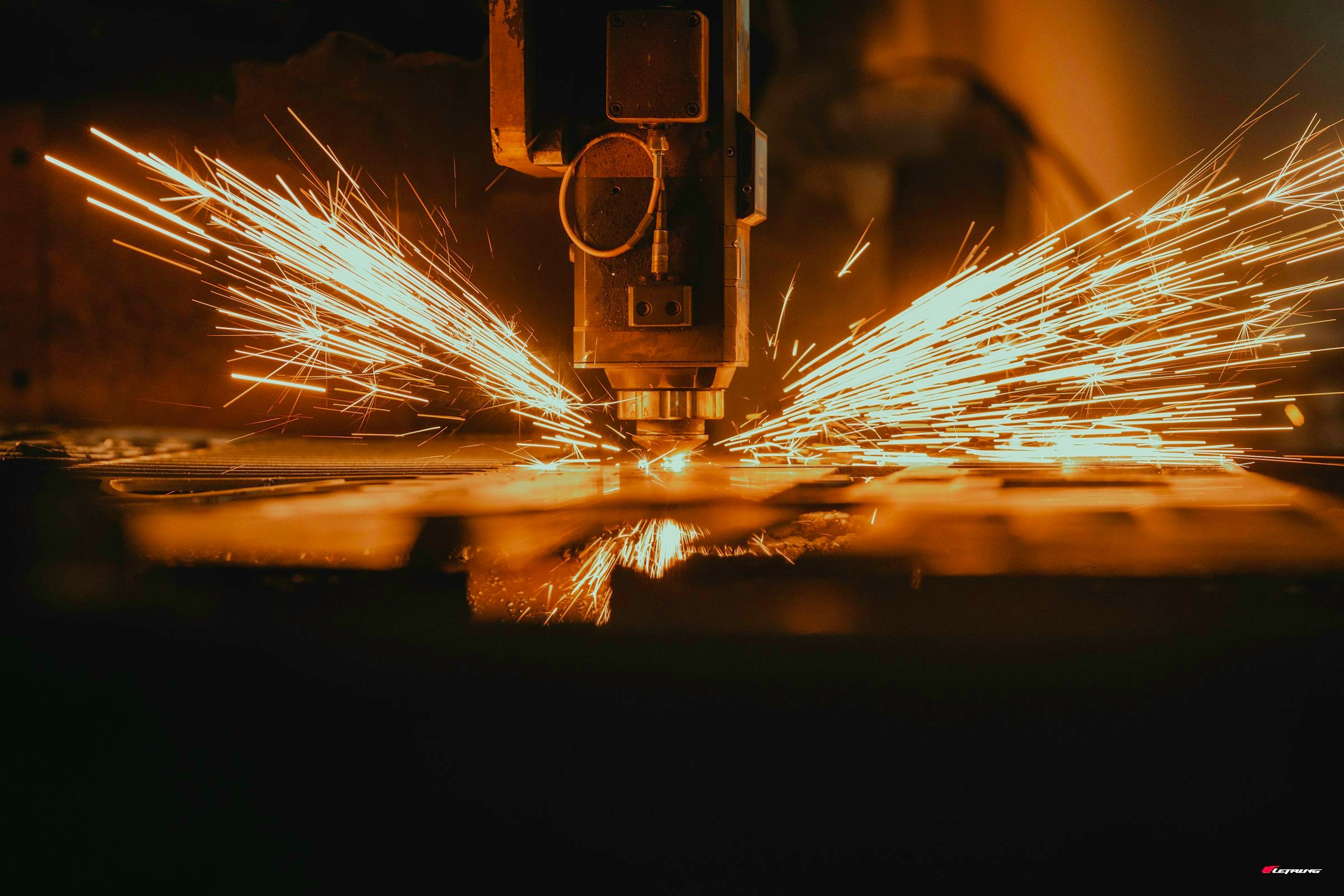 A machined aluminium part being cut