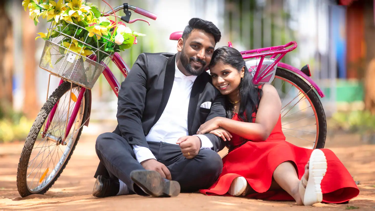 A type 2 diabetic Indian woman smiling together with her husband.