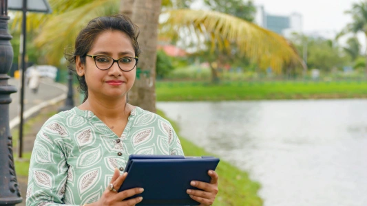 A confident, professional Indian type 2 diabetic woman.