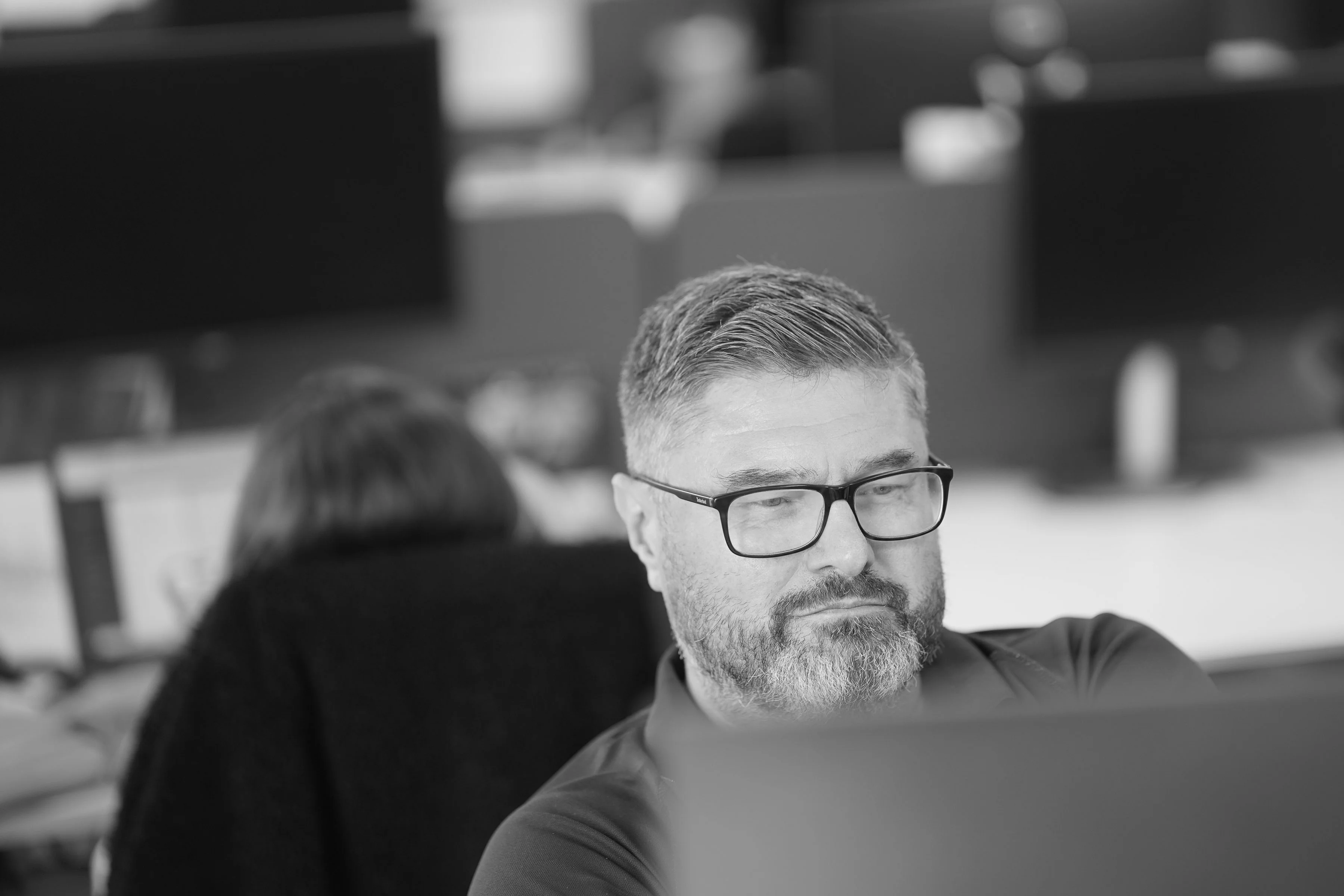 ACS employee - man looking at screen