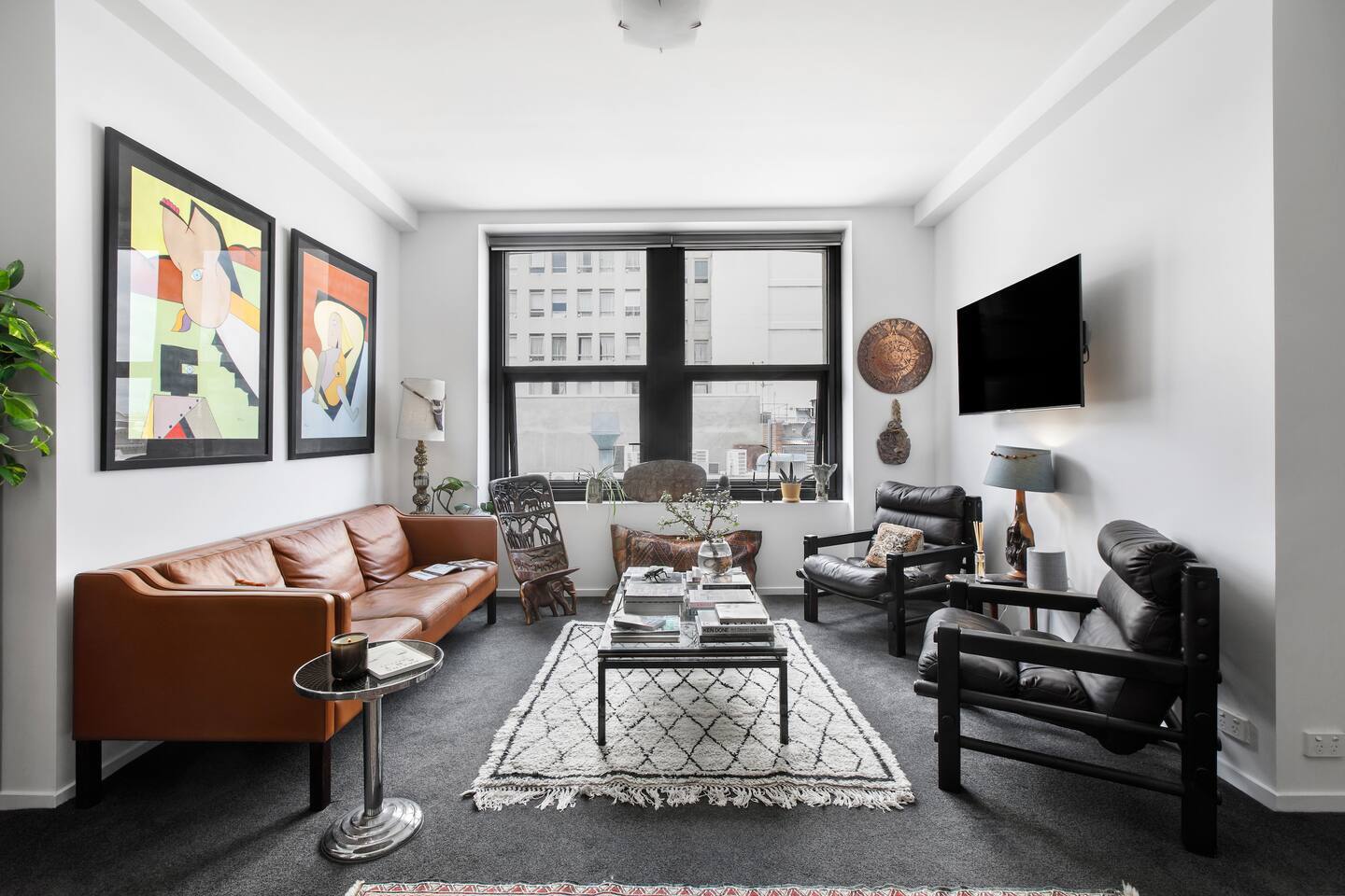 The living area has been thoughtfully styled to create a warm and welcoming retreat to come home to.