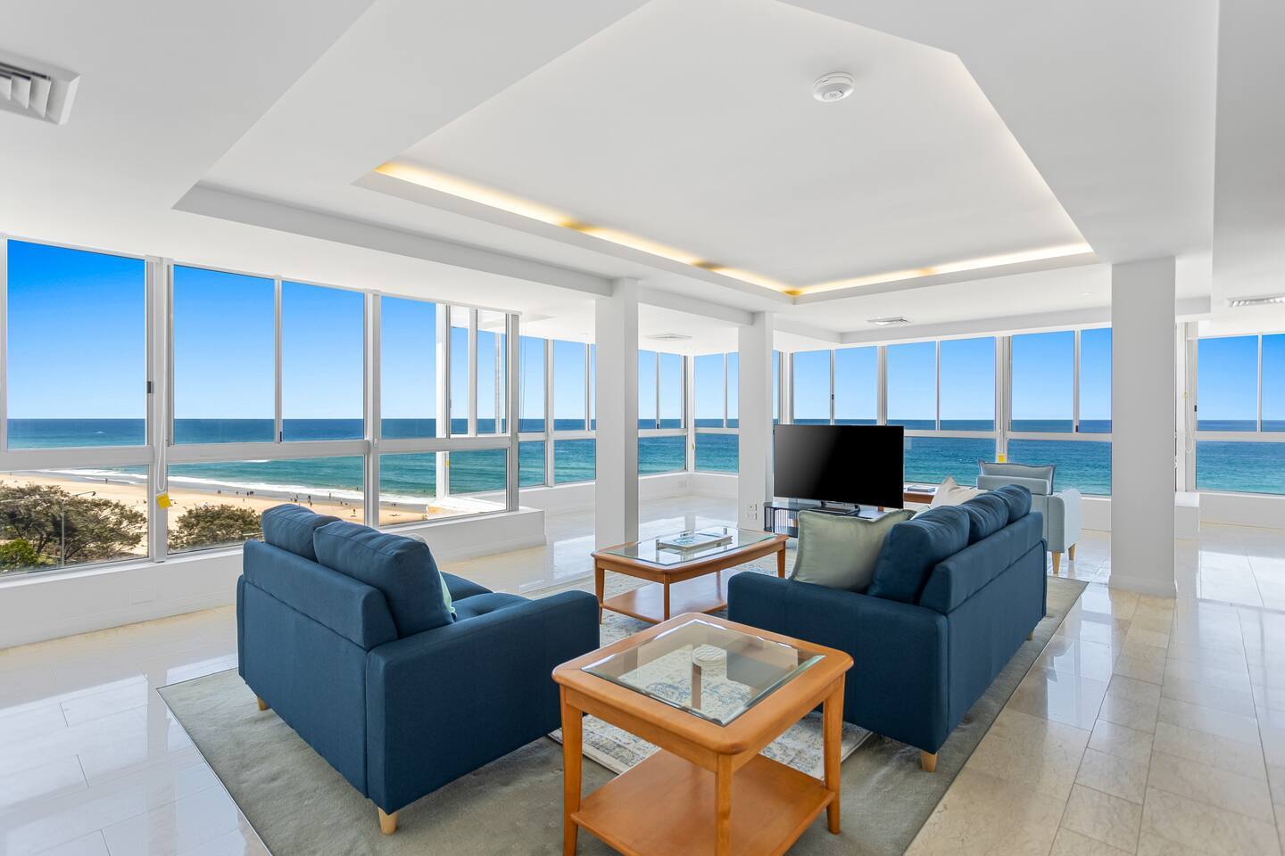 The spacious living room comes with comfortable sofa seating and a TV for movie nights at home. Enjoy year-round comfort with central cooling and heating to keep you cosy in any season.