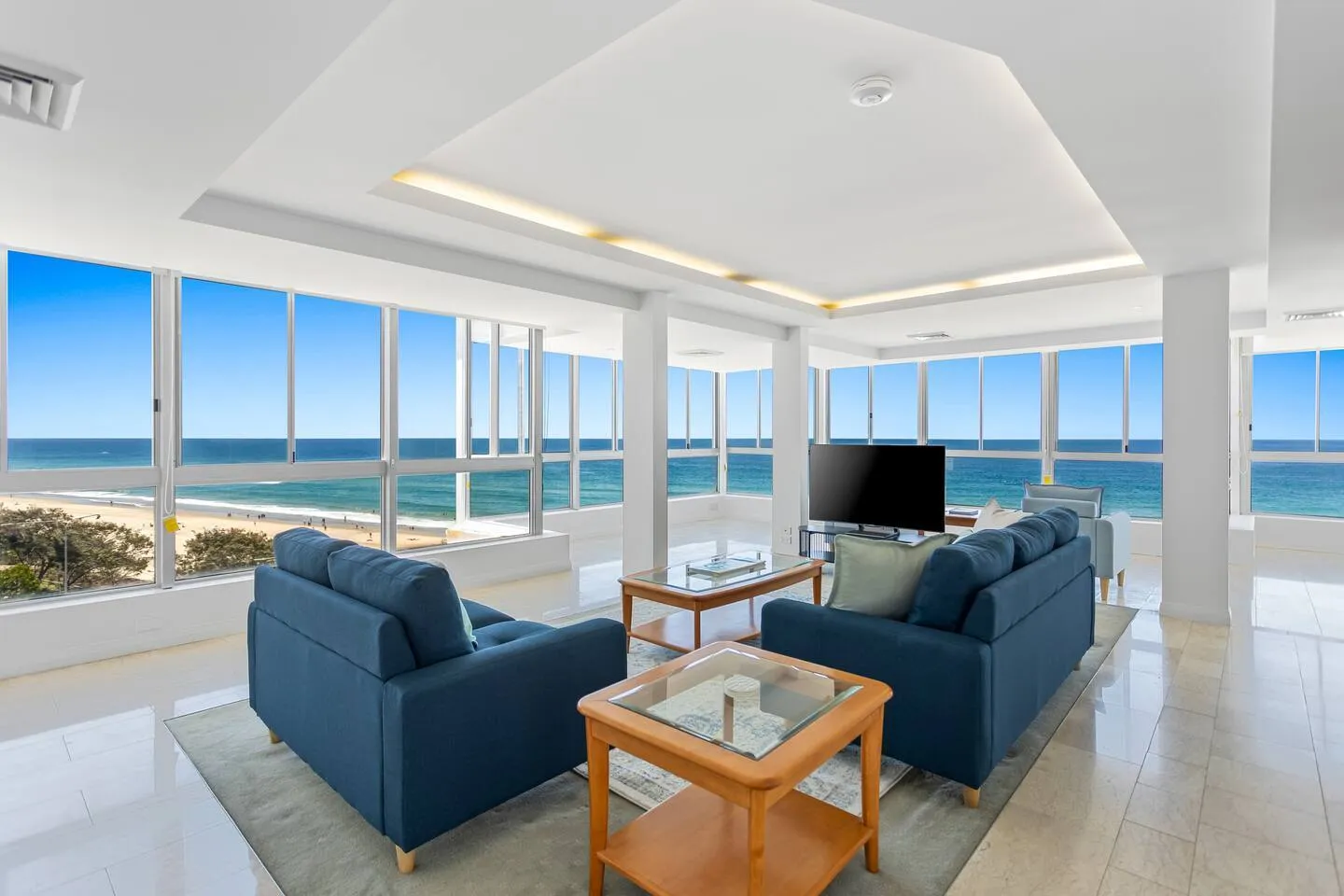 The spacious living room comes with comfortable sofa seating and a TV for movie nights at home. Enjoy year-round comfort with central cooling and heating to keep you cosy in any season.