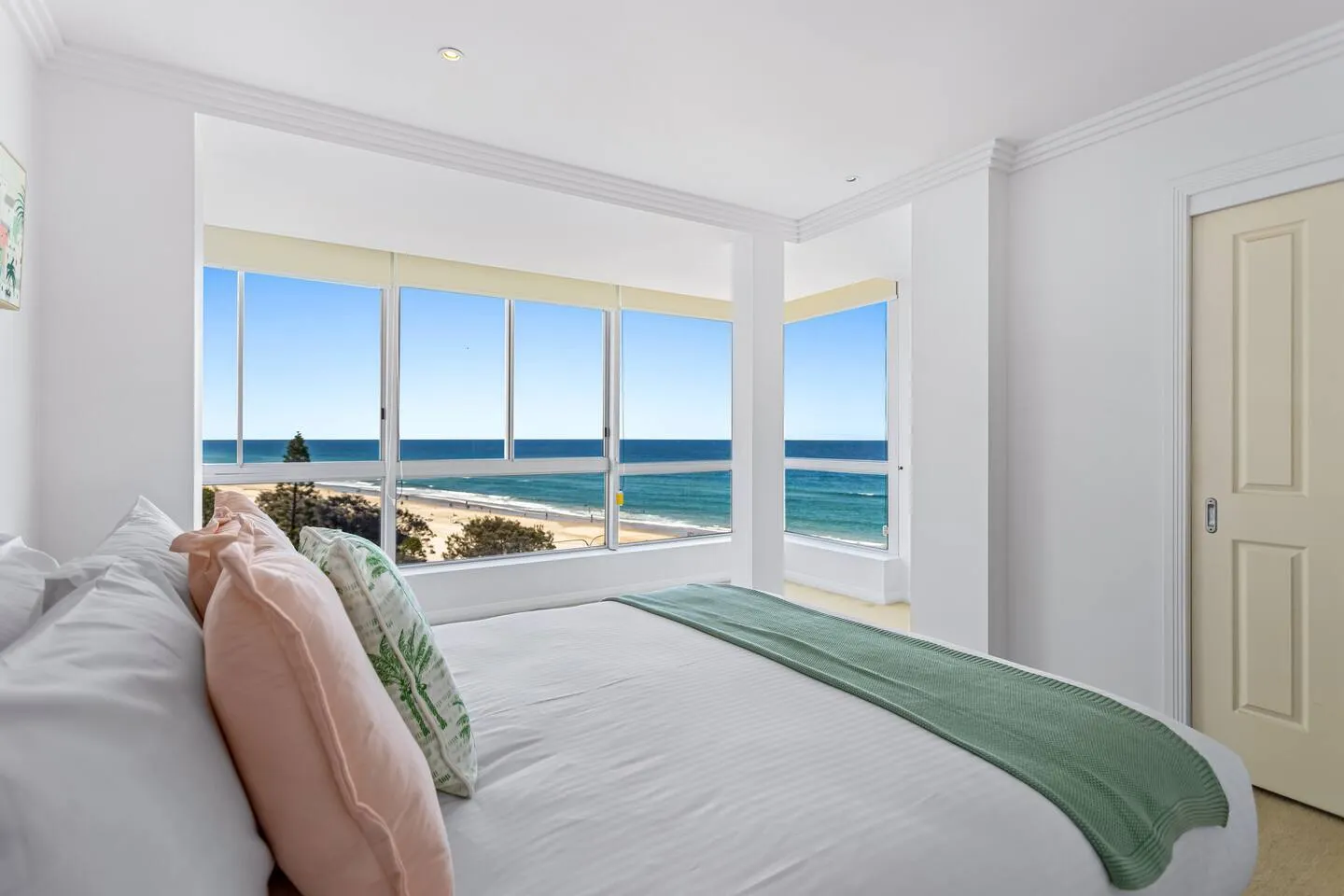 The primary bedroom is an oversized retreat and boasts spectacular views, a queen-sized bed and a sumptuous ensuite bathroom.