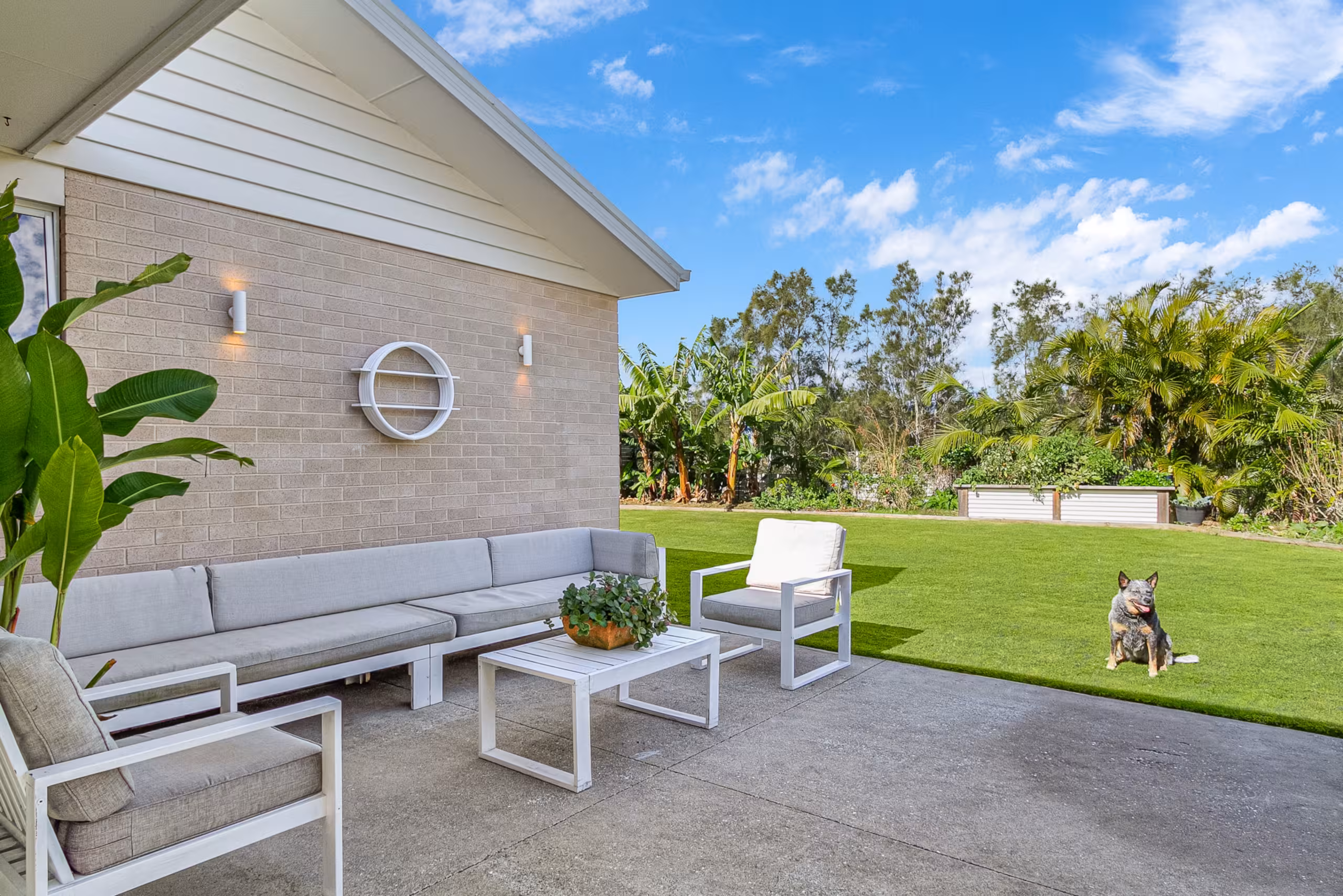 Inviting lawn and lounge setting made for long afternoons outside.