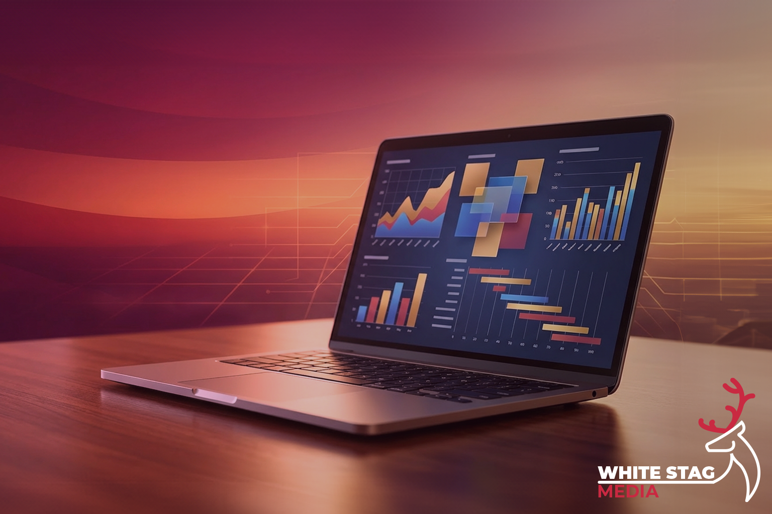 White Stag Media blog header showing laptop, interface elements and bold web design graphics