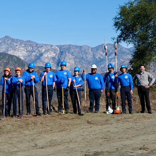 A group of corps members post for a photo.