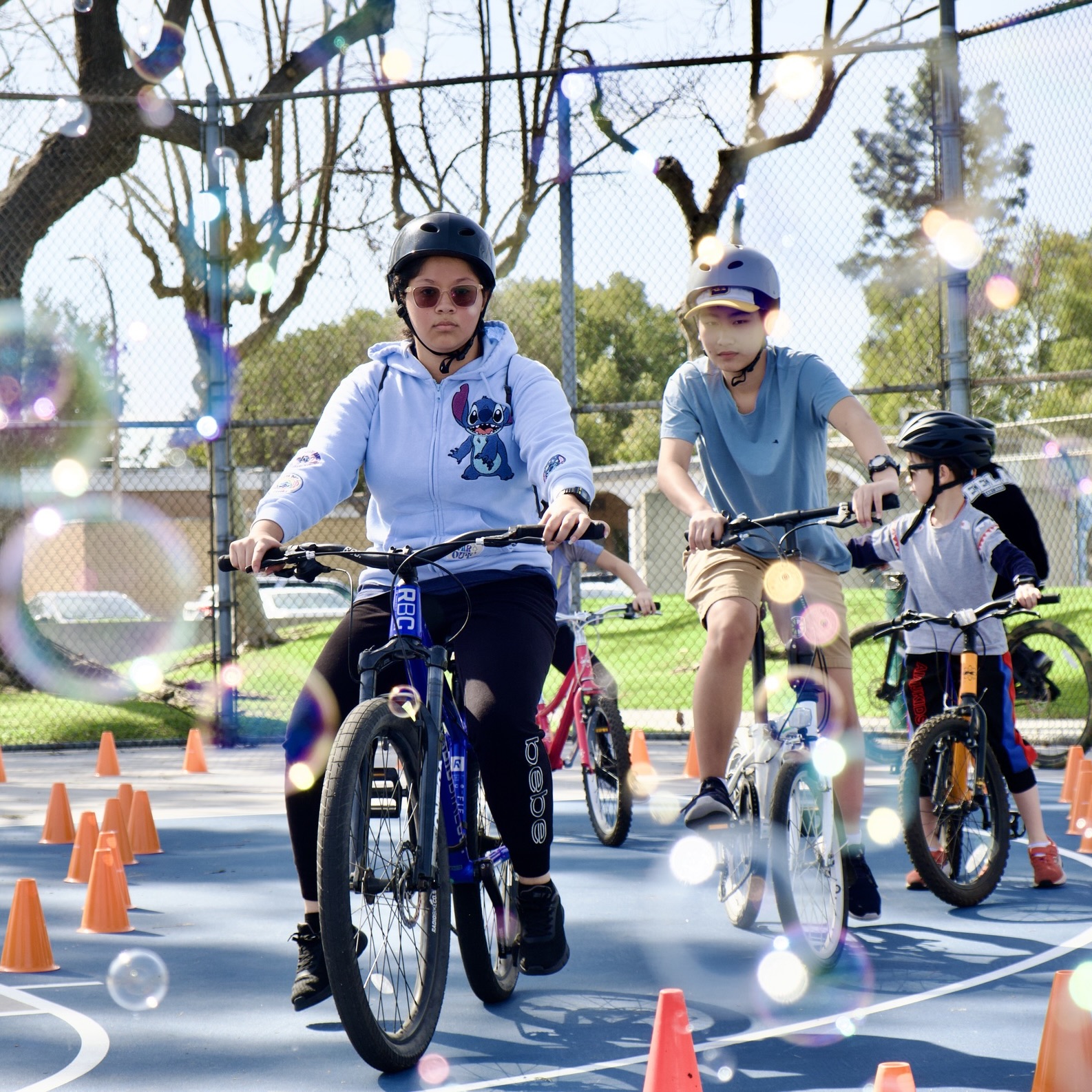 Young cyclists make their way through a skills course.