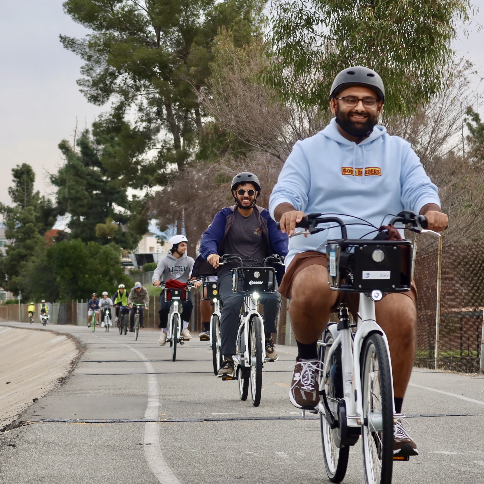 Cyclist riding down a bike path.