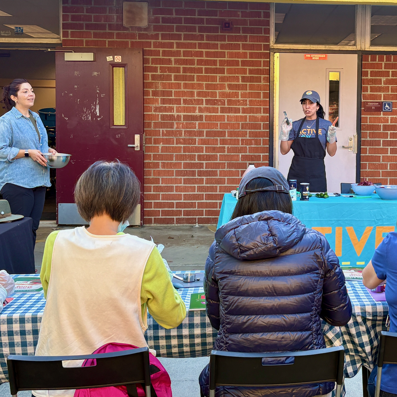 Community members participate in a pickling workshop.