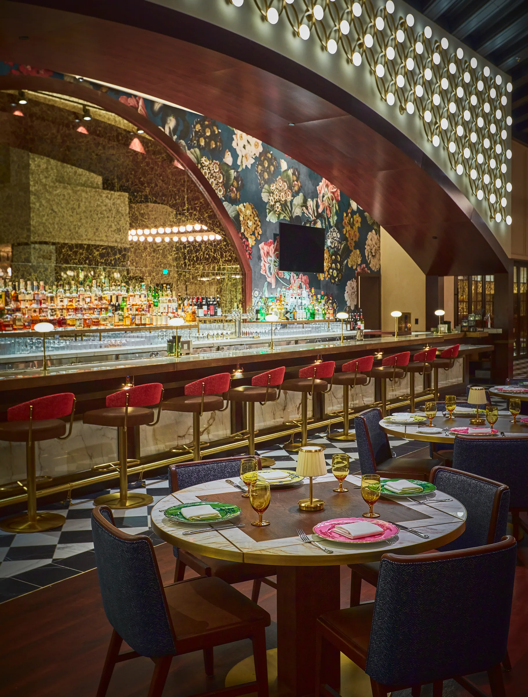 Carama bar seating under the mural arch, vertical view