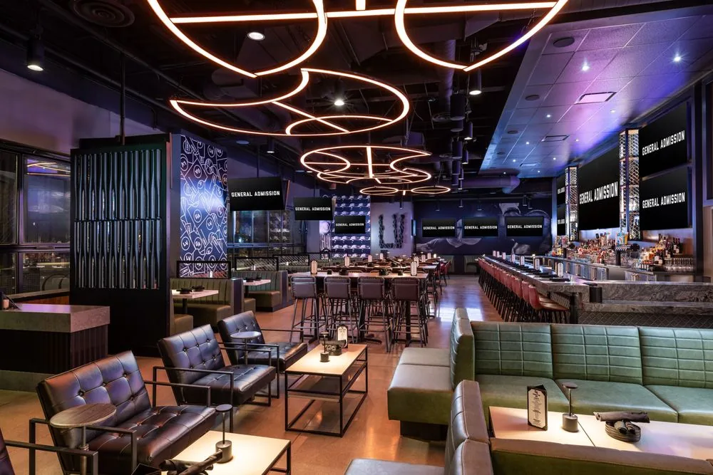 General Admission lounge seating under neon ring lighting