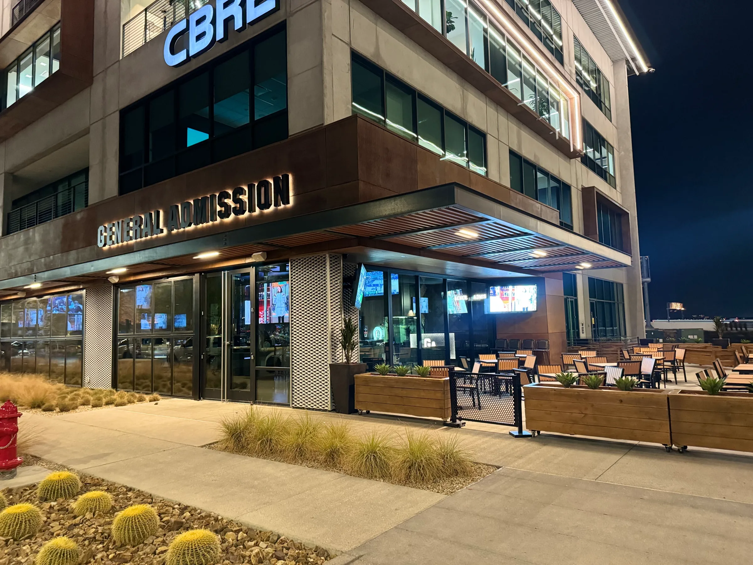 General Admission exterior entrance and patio at UnCommons at night