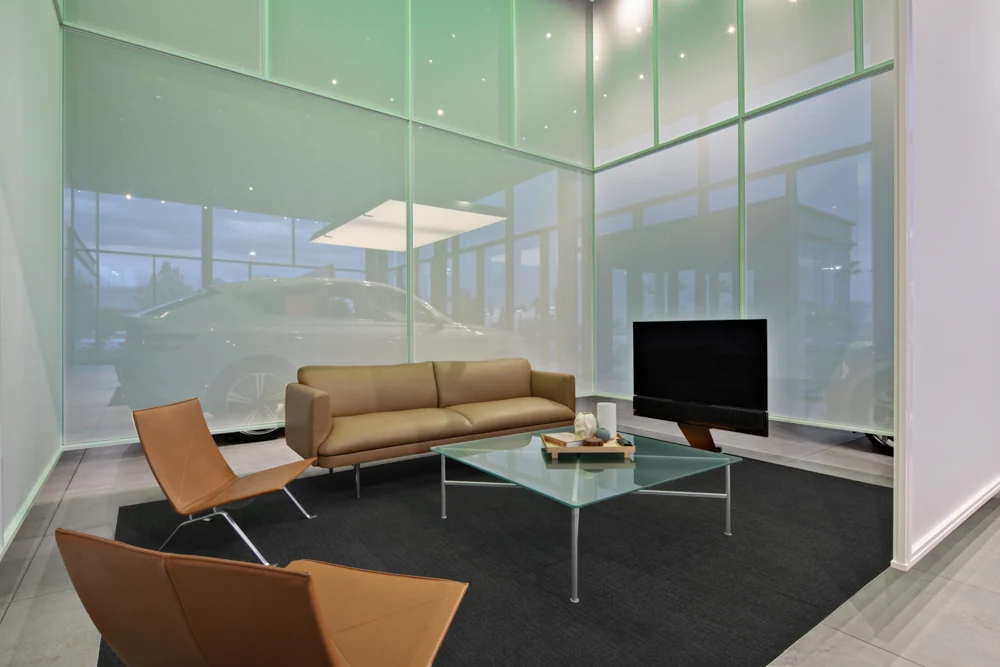 Genesis private customer lounge with translucent wall panels