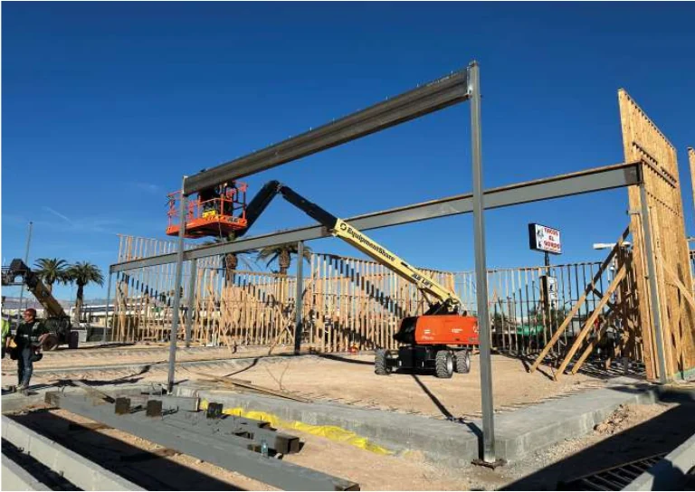 Town Square Pad 2 structural steel and wall framing during construction