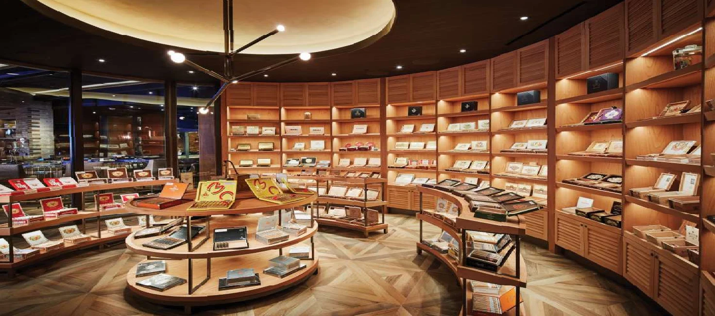 Curved cigar displays and wood shelving in the Montecristo humidor at Caesars Palace