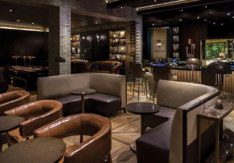 Seating and bar area inside Montecristo Cigar Bar at Caesars Palace