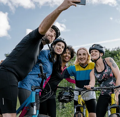 Biking club taking photo together