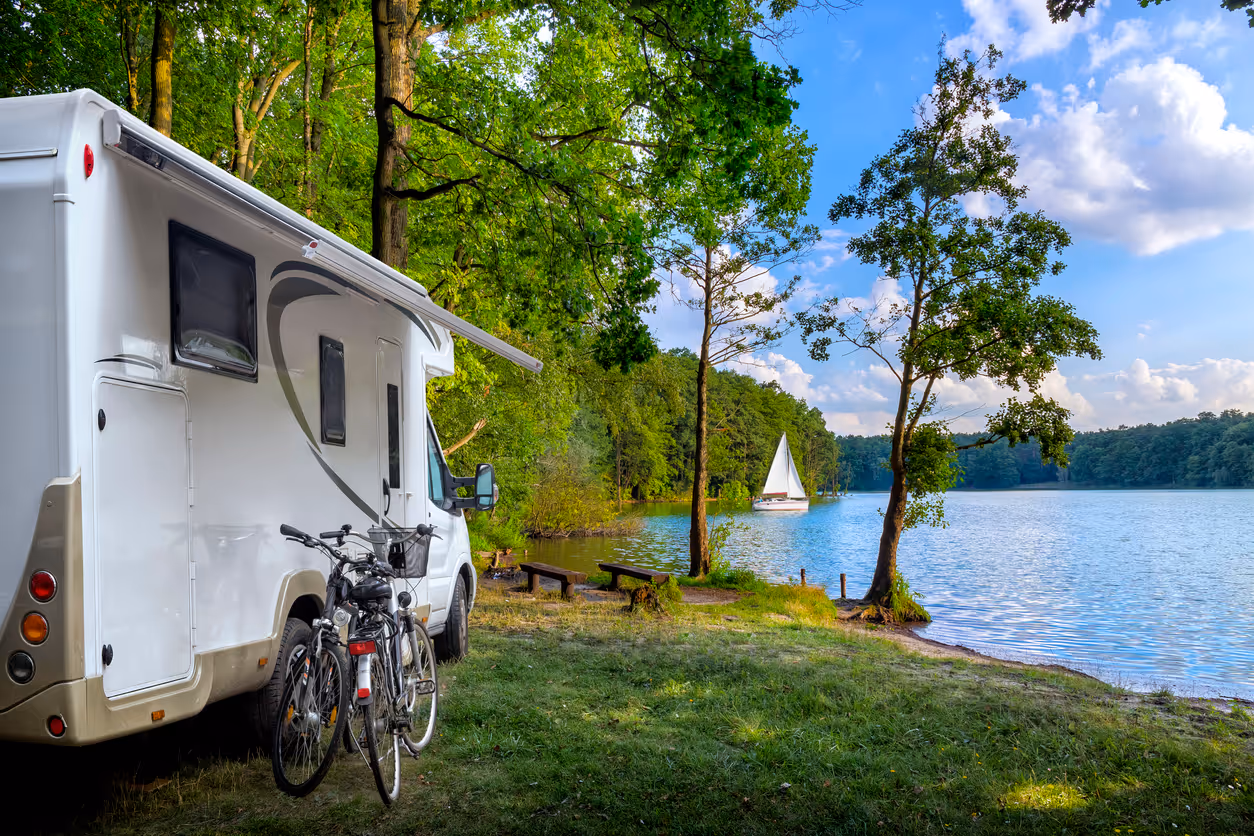 Summer recreation at the lake in camper