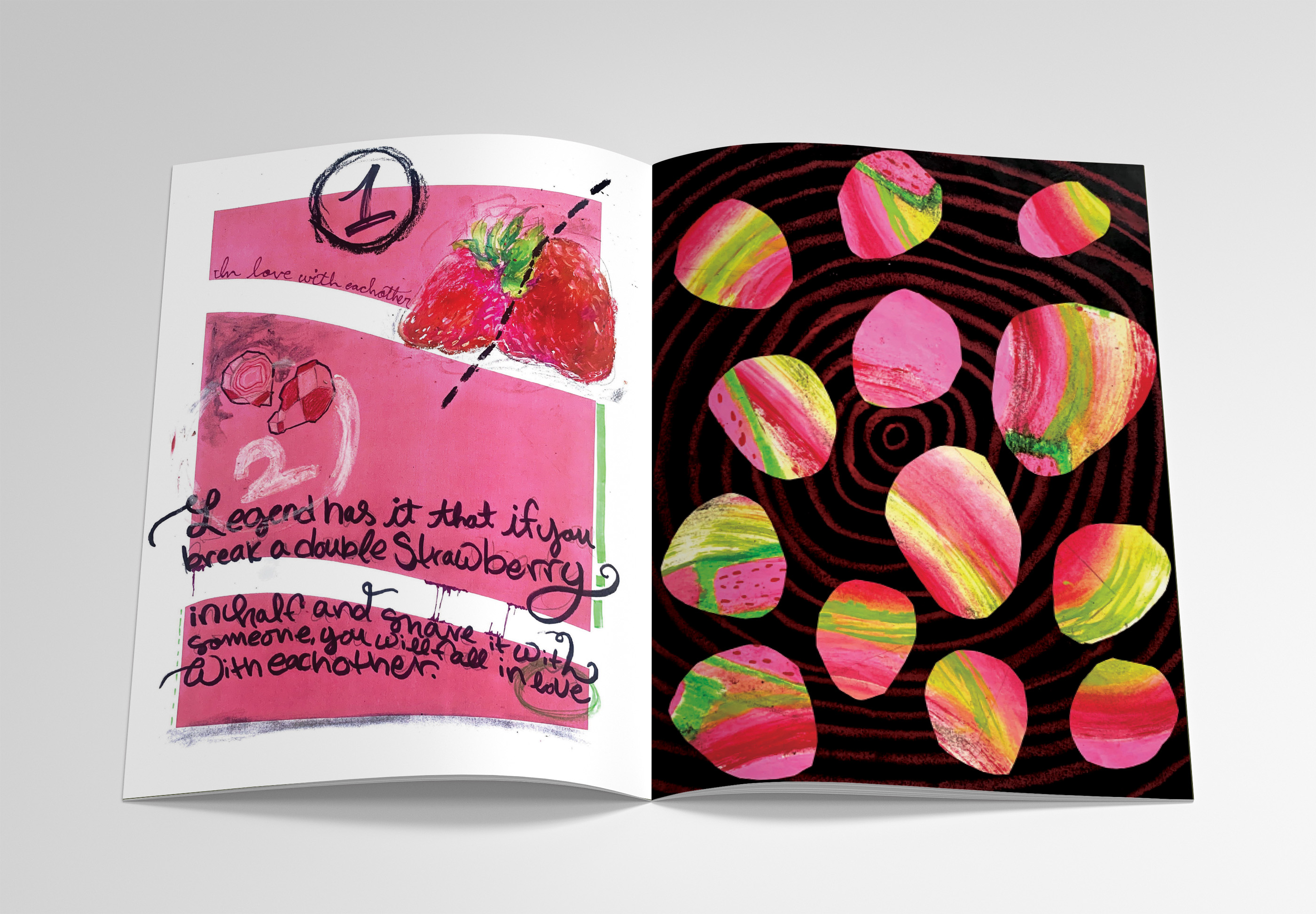 Open book spread with artistic strawberry imagery