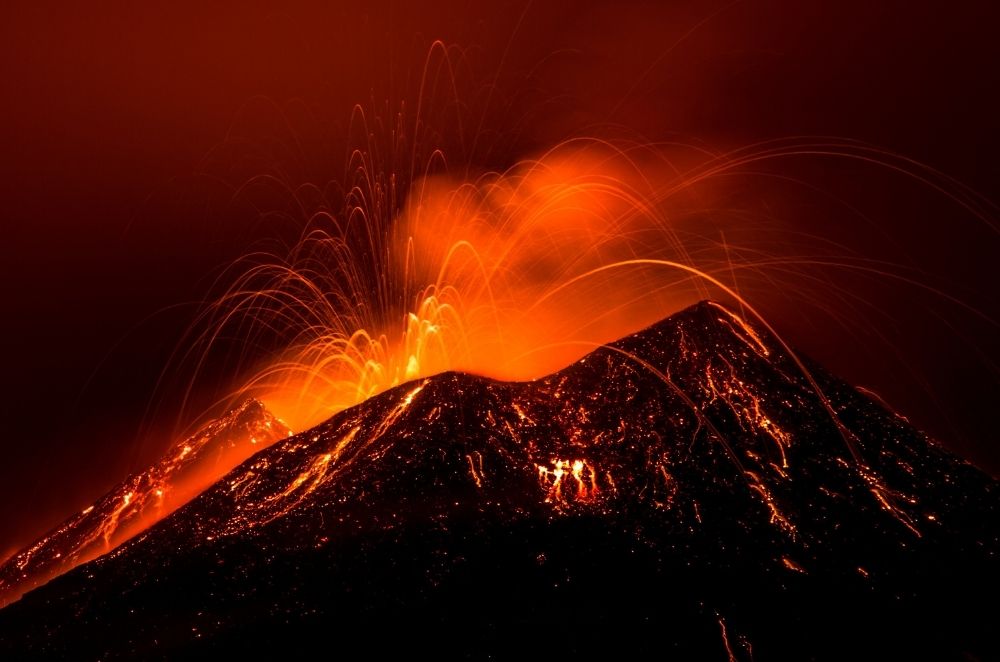 Mount Etna erupting with lava flow