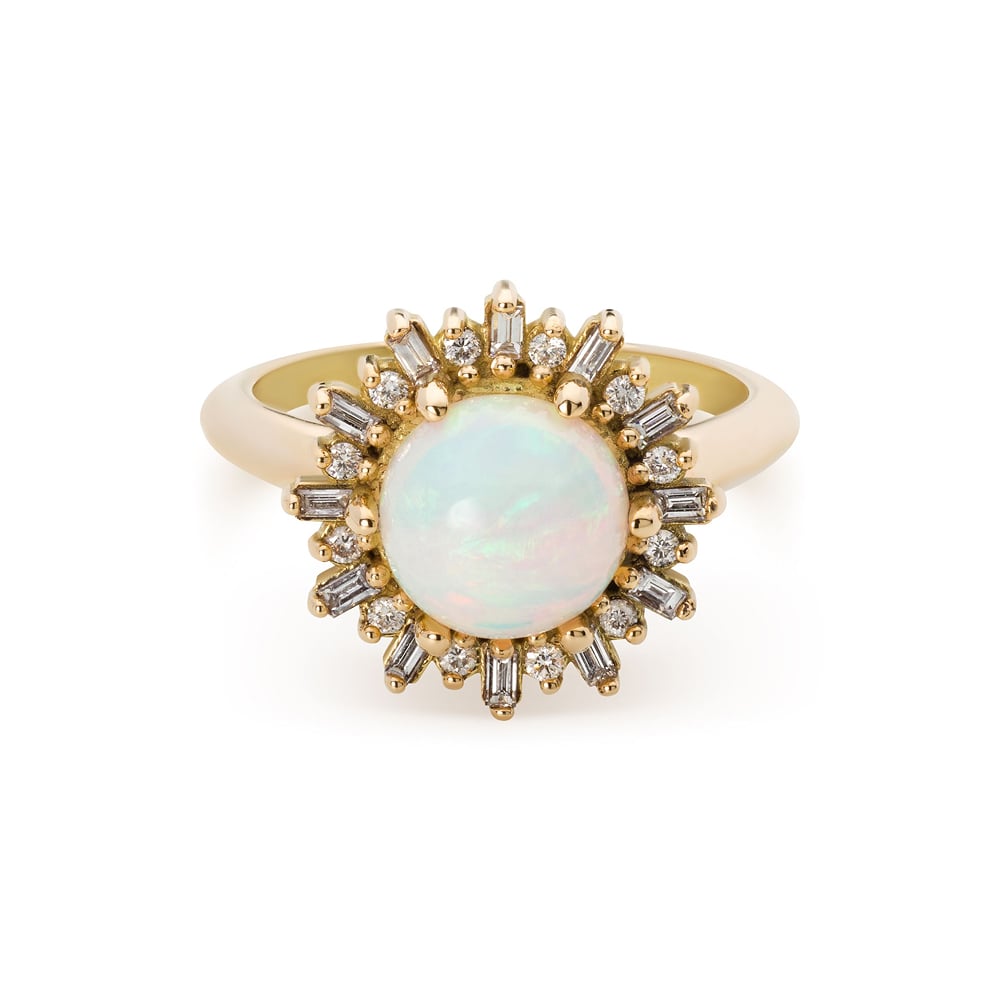 product photo of a gold ring on a white background