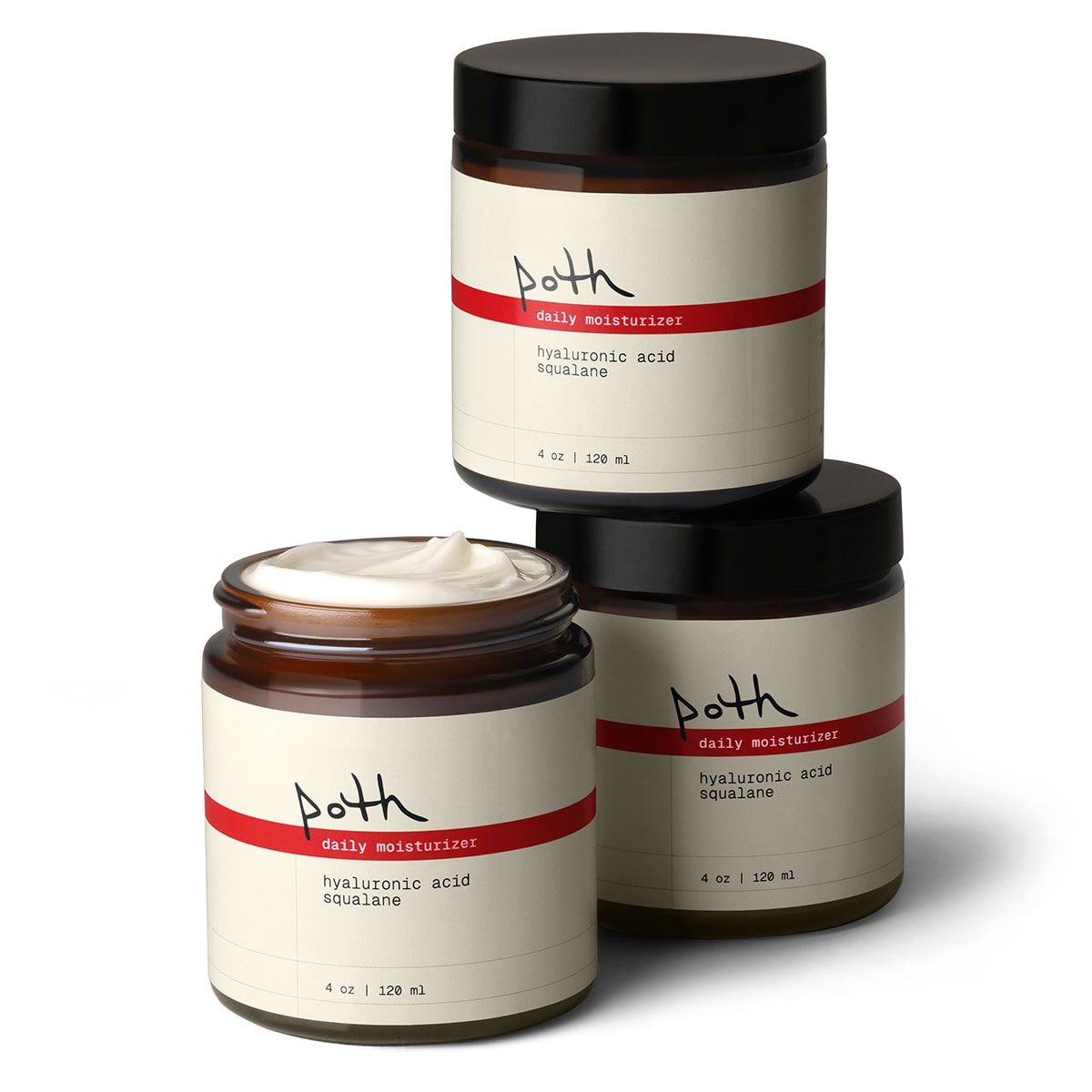 stacked poth skincare products in amber glass jars with red labels on white background