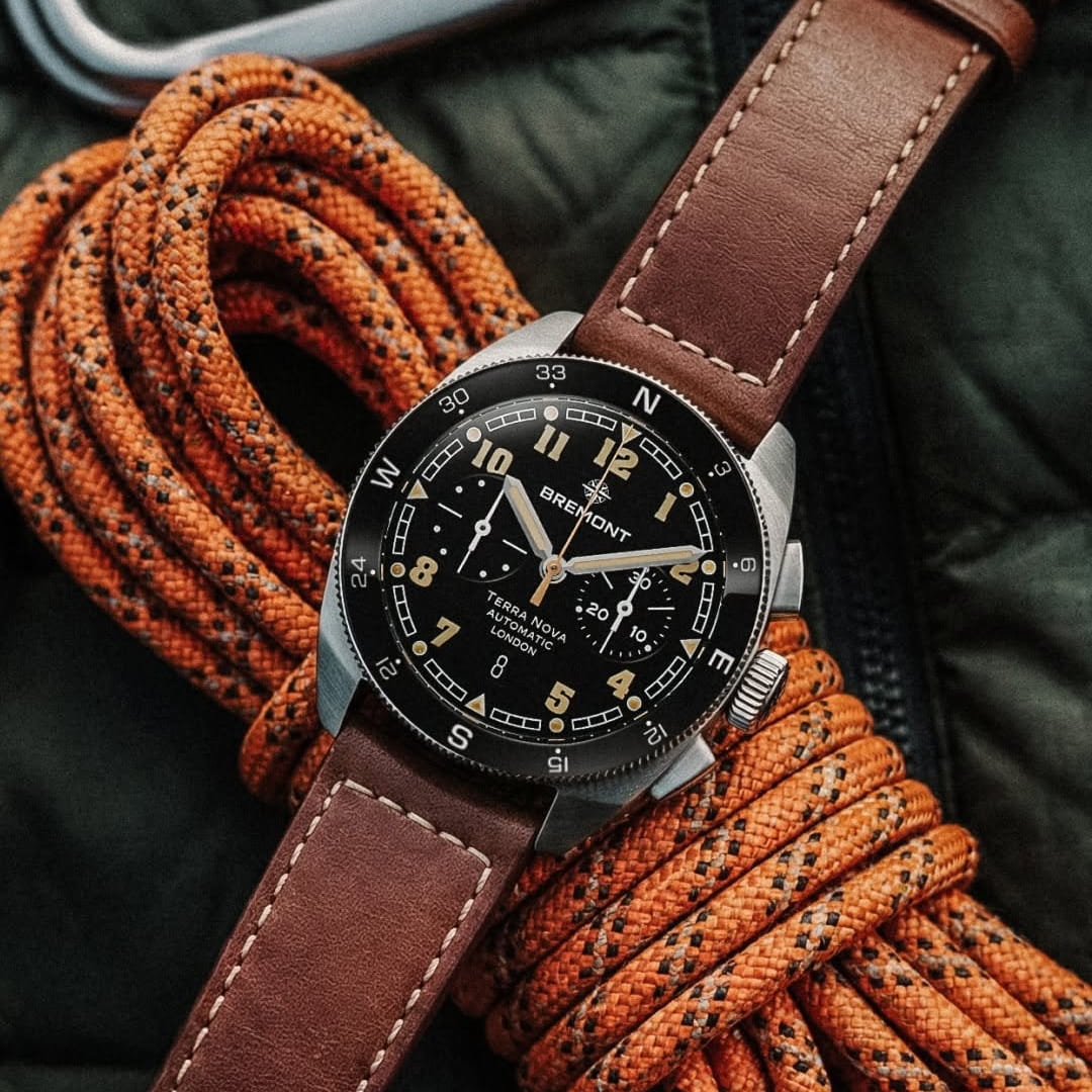 Luxury wristwatch with leather strap styled on coiled rope for a rugged look