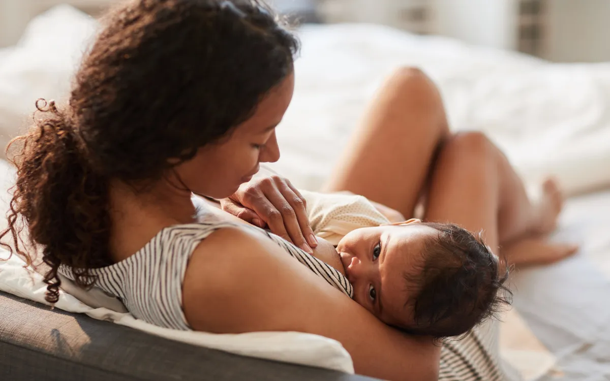 Woman beastfeeding baby worried about engorgement