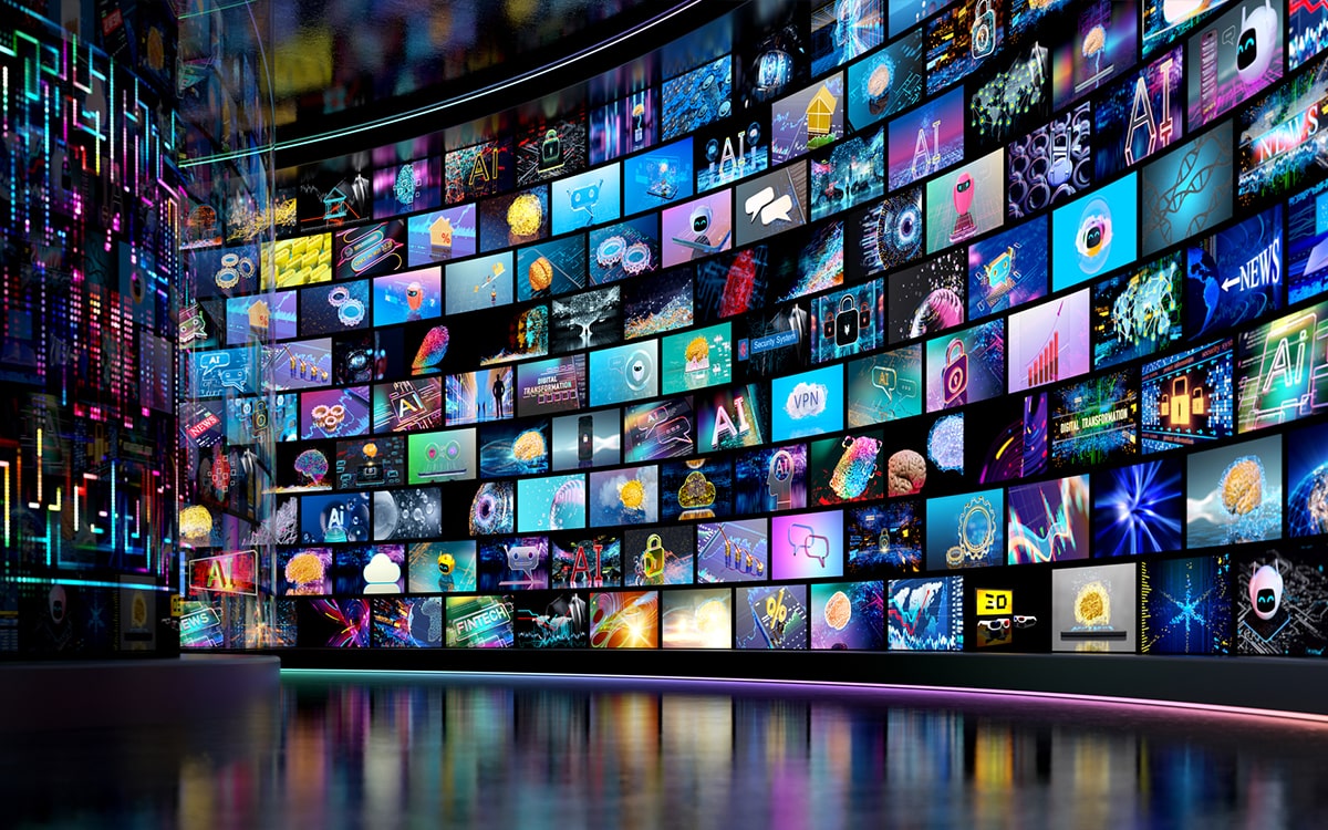 Wall of digital screens displaying AI, cybersecurity, fintech, and tech innovation visuals at a futuristic CES-style expo
