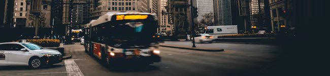 City bus driving in downtown Chicago.