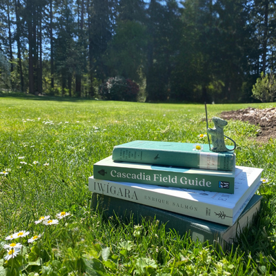 Books in a meadow