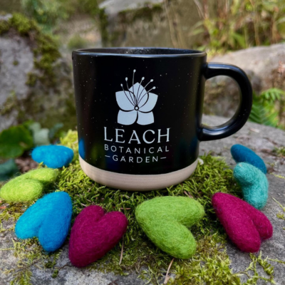 A cup surrounded by hearts