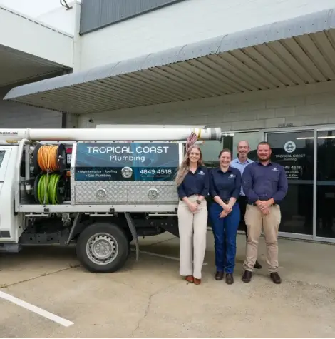 Tropical Coast Plumbing team outside their Townsville office, trusted local plumbers specialising in clearing blocked drains.
