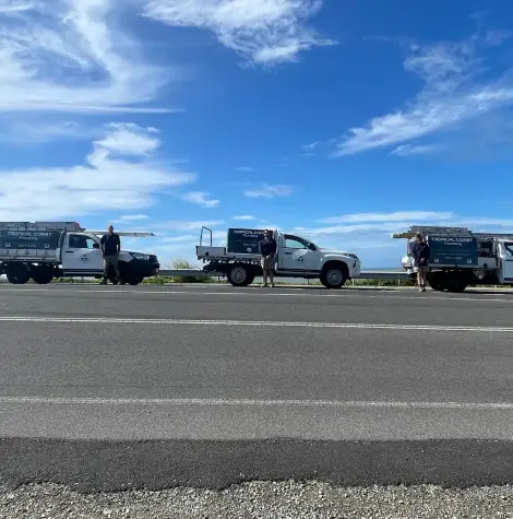 Tropical Coast Plumbing service vehicles in North Queensland, delivering solar roof ventilation and professional plumbing solutions.