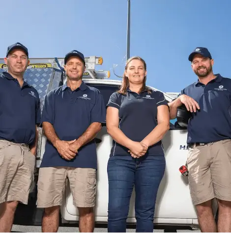 Tropical Coast Plumbing team in Townsville, licensed specialists in SolarKing fan installation, roof ventilation, and plumbing services.