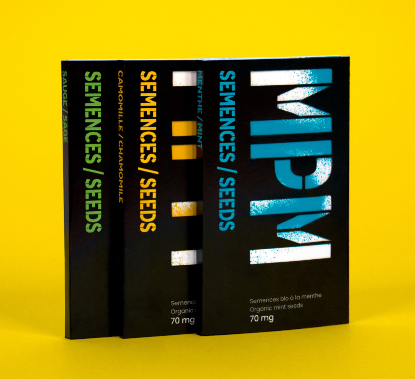 All 3 packages are standing vertically, with the mint package on the right showing the entire front facing and the chamomile packaged slightly hidden behind it and the sage package even more hidden behind the chamomile. All packages are shown on a bright orange-yellow shade (the same associated to the chamomile package).