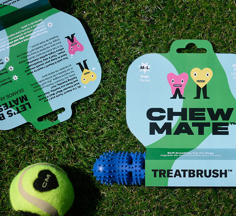 Photograph of 3 assembled packages accompanied by custom Chewmate™ tennis balls.
