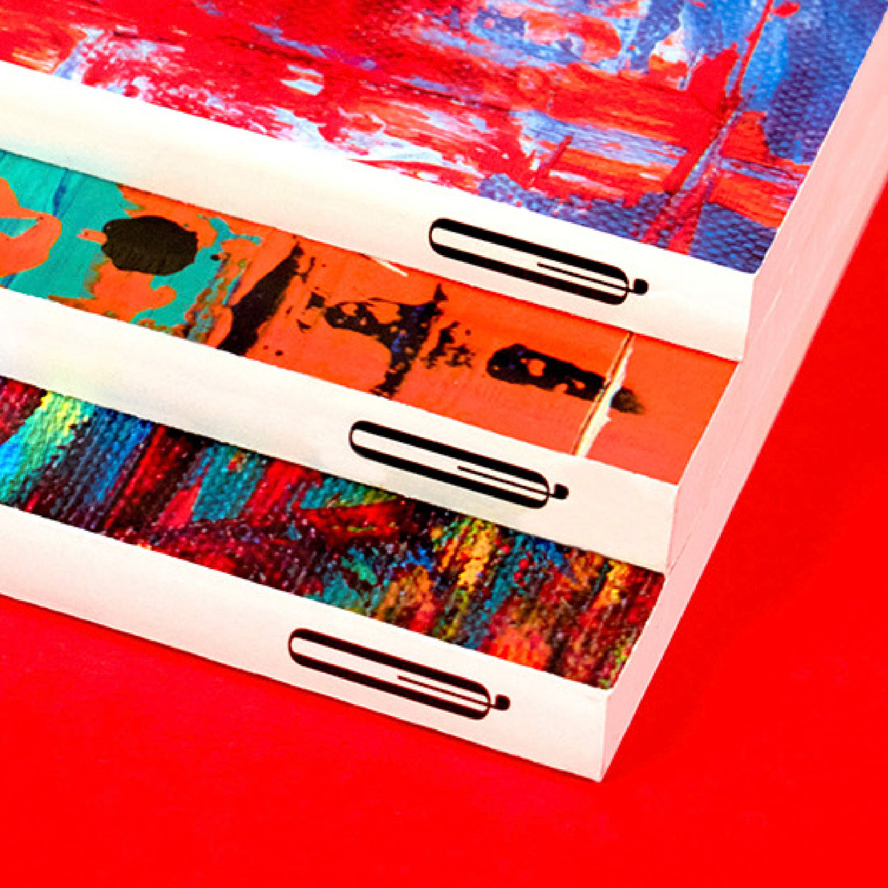 Close up detail of book spines to show the new logo design for Quattro Books